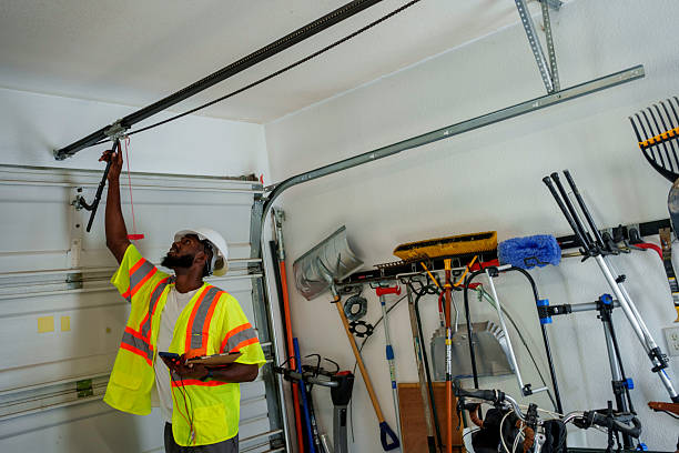 Professional Garage Door Spring Repair technician working in East Hampton North, NY